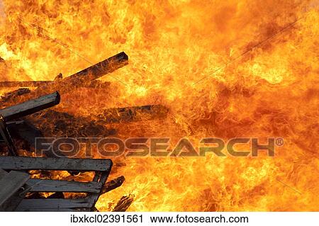 Stock Image - "Bonfire during the midsummer festival in the town of Longyearbyen, Spitsbergen, Svalbard, Norway, Europe". Fotosearch