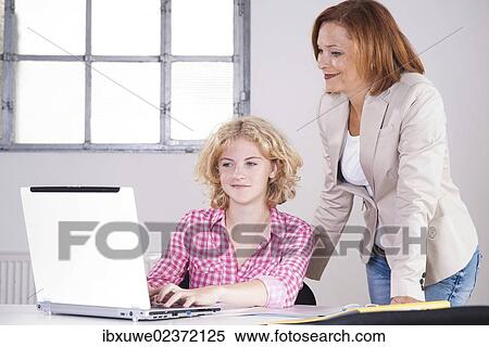 Boss in conversation with a trainee View Large Photo Image Stock Photography - Boss in conversation with a trainee. Fotosearch