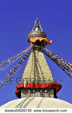 "Boudhanath Stupa, UNESCO World Heritage Site, painted eyes, colorful prayer flags, Tibetan Buddhism, Kathmandu, Nepal, Asia" View Large Photo Image Stock Photo - "Boudhanath Stupa, UNESCO World Heritage Site, painted eyes, colorful prayer flags, Tibetan Buddhism, Kathmandu, Nepal, Asia". Fotosearch