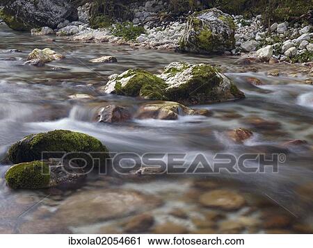 "Boulders and rocks in the river bed of the Soca river in Soca Valley near Bovec, Triglav National Park, Slovenia, Europe" View Large Photo Image Stock Image - "Boulders and rocks in the river bed of the Soca river in Soca Valley near Bovec, Triglav National Park, Slovenia, Europe". Fotosearch