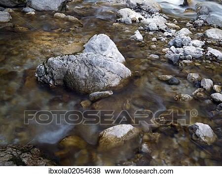 "Boulders and rocks in the river bed of the Soca river, Soca Valley near Trenta, Triglav National Park, Slovenia, Europe" View Large Photo Image Stock Photo - "Boulders and rocks in the river bed of the Soca river, Soca Valley near Trenta, Triglav National Park, Slovenia, Europe". Fotosearch