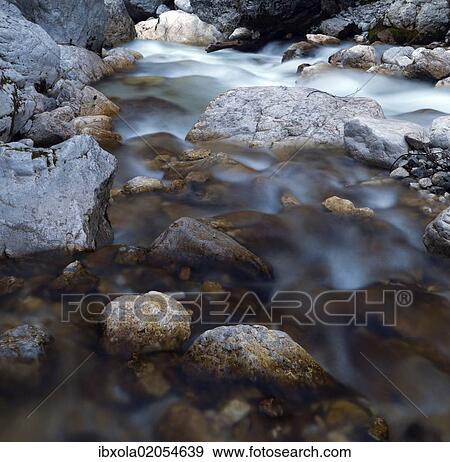 Stock Photo - "Boulders and rocks in the river bed of the Soca river, Soca Valley near Trenta, Triglav National Park, Slovenia, Europe". Fotosearch