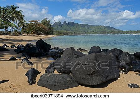 "Boulders on the beach, Anahola Bay, Anahola, Kaua'i, Hawaii, United States, North America" View Large Photo Image Picture - "Boulders on the beach, Anahola Bay, Anahola, Kaua'i, Hawaii, United States, North America". Fotosearch