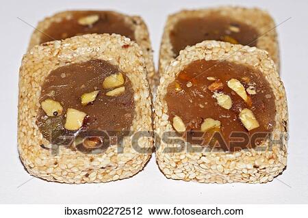 "Bourma, Burma, Arab and Turkish sweets, made from pistachios, sesame, honey, glucose syrup" View Large Photo Image Stock Image - "Bourma, Burma, Arab and Turkish sweets, made from pistachios, sesame, honey, glucose syrup". Fotosearch