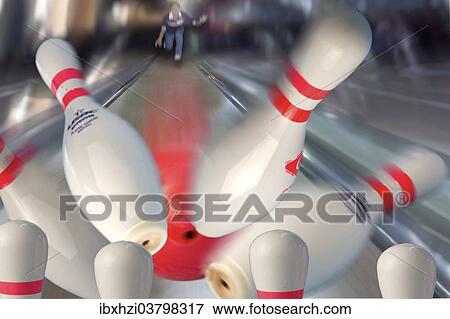 Bowling pins being hit by a red bowling ball View Large Photo Image Stock Photo - Bowling pins being hit by a red bowling ball. Fotosearch