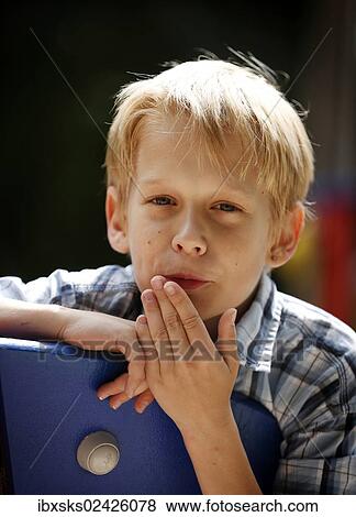 "Boy, 10 years, on a playground, portrait" View Large Photo Image Stock Photo - "Boy, 10 years, on a playground, portrait". Fotosearch