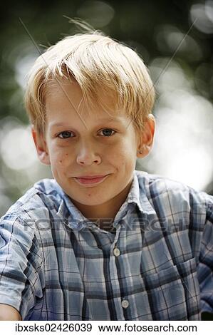 "Boy, 10 years, portrait" View Large Photo Image Stock Photo - "Boy, 10 years, portrait". Fotosearch