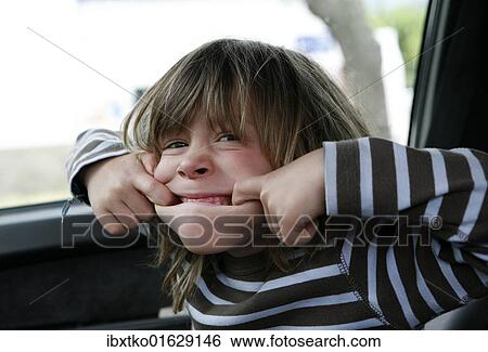 "Boy, 5, making a grimace" View Large Photo Image Stock Photograph - "Boy, 5, making a grimace". Fotosearch