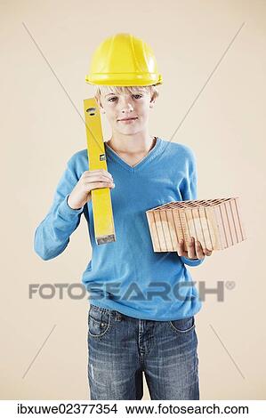Boy dressed as a craftsman or workman View Large Photo Image Picture - Boy dressed as a craftsman or workman. Fotosearch