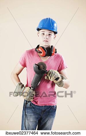 Boy dressed as a craftsman or workman View Large Photo Image Picture - Boy dressed as a craftsman or workman. Fotosearch