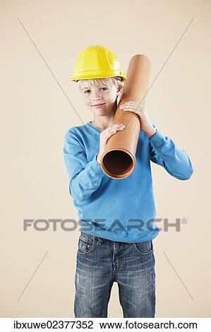 Boy dressed as a craftsman or workman View Large Photo Image Stock Image - Boy dressed as a craftsman or workman. Fotosearch