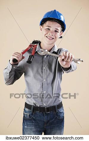 Boy dressed as a craftsman or workman View Large Photo Image Stock Image - Boy dressed as a craftsman or workman. Fotosearch