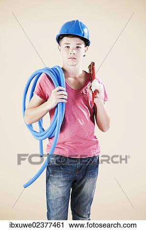 Boy dressed as a craftsman or workman View Large Photo Image Stock Image - Boy dressed as a craftsman or workman. Fotosearch
