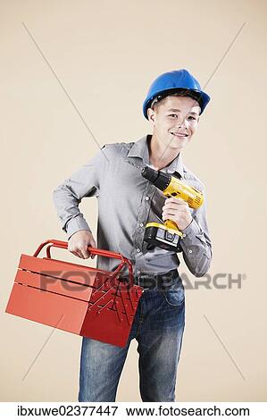 Boy dressed as a craftsman or workman View Large Photo Image Stock Photo - Boy dressed as a craftsman or workman. Fotosearch