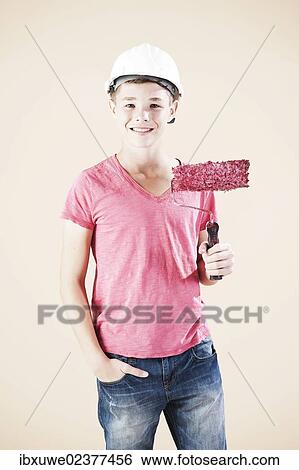 Boy dressed as a craftsman or workman View Large Photo Image Stock Photograph - Boy dressed as a craftsman or workman. Fotosearch