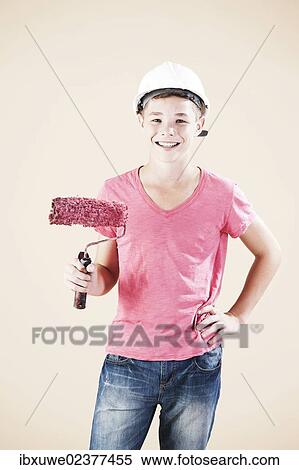 Boy dressed as a craftsman or workman View Large Photo Image Stock Photography - Boy dressed as a craftsman or workman. Fotosearch