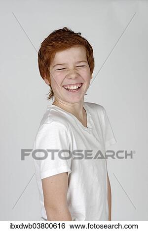 Boy laughing with his eyes closed View Large Photo Image Stock Photograph - Boy laughing with his eyes closed. Fotosearch