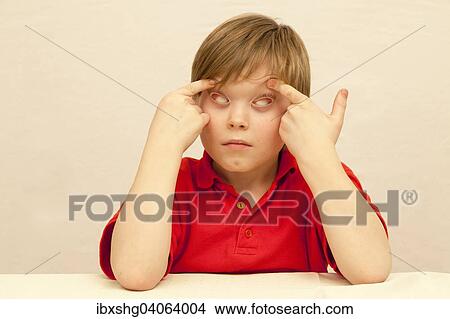 Boy making a face View Large Photo Image Picture - Boy making a face. Fotosearch