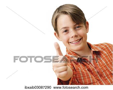 "Boy, smiling, making a thumbs up gesture" View Large Photo Image Stock Image - "Boy, smiling, making a thumbs up gesture". Fotosearch