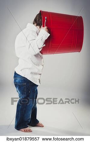 "Boy, two years, with a tin bucket over his head" View Large Photo Image Stock Photo - "Boy, two years, with a tin bucket over his head". Fotosearch