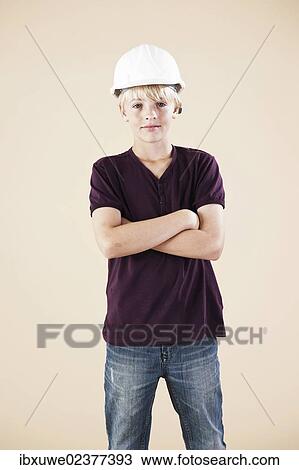 Stock Image - Boy with a hard hat. Fotosearch