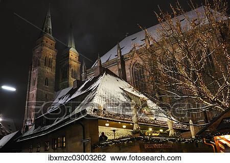 "Bratwursthaeusle restaurant in the evening light, Advent season, St. Sebaldus Church at the back, Rathausplatz, Innenstadt, Nuremberg, Middle Franconia, Bavaria, Germany, Europe" View Large Photo Image Stock Image - "Bratwursthaeusle restaurant in the evening light, Advent season, St. Sebaldus Church at the back, Rathausplatz, Innenstadt, Nuremberg, Middle Franconia, Bavaria, Germany, Europe". Fotosearch