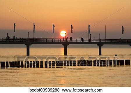 "Breakwaters or groynes, pier, sunset, Baltic Sea, Zingst, Fischland-Darss-Zingst peninsula, Mecklenburg-Western Pomerania, Germany, Europe" View Large Photo Image Stock Photo - "Breakwaters or groynes, pier, sunset, Baltic Sea, Zingst, Fischland-Darss-Zingst peninsula, Mecklenburg-Western Pomerania, Germany, Europe". Fotosearch
