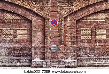 Stock Photo - "Brickwork, wall, with a no stopping sign, Berlin, Germany, Europe". Fotosearch