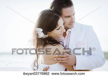 "Bridal couple embracing, Spain, Europe" View Large Photo Image Stock Image - "Bridal couple embracing, Spain, Europe". Fotosearch