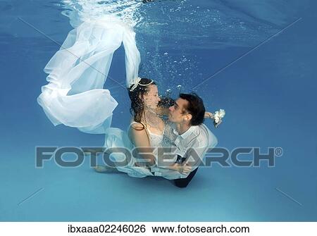 "Bridal couple, underwater wedding in pool, Odessa, Ukraine, Eastern Europe, Europe" View Large Photo Image Stock Photograph - "Bridal couple, underwater wedding in pool, Odessa, Ukraine, Eastern Europe, Europe". Fotosearch