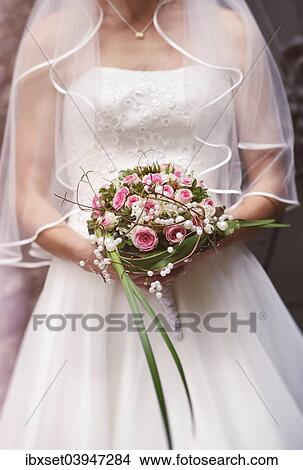 "Bride, bridal bouquet, wedding dress, veil" View Large Photo Image Picture - "Bride, bridal bouquet, wedding dress, veil". Fotosearch