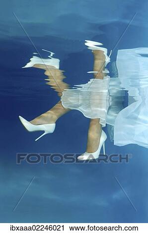 "Bride's feet, underwater wedding in pool, Odessa, Ukraine, Eastern Europe, Europe" View Large Photo Image Stock Image - "Bride's feet, underwater wedding in pool, Odessa, Ukraine, Eastern Europe, Europe". Fotosearch