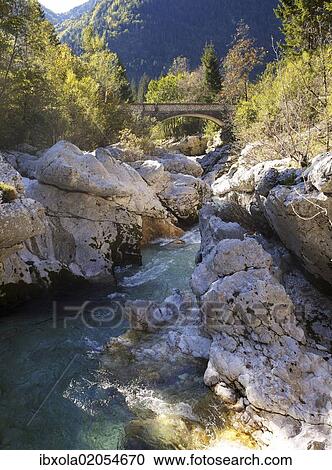 "Bridge across a narrow rocky gorge overlooking the turquoise Soca river in the Soca Valley near Bovec, Triglav National Park, Slovenia, Europe" View Large Photo Image Stock Image - "Bridge across a narrow rocky gorge overlooking the turquoise Soca river in the Soca Valley near Bovec, Triglav National Park, Slovenia, Europe". Fotosearch