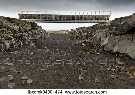 "Bridge between the continents crosses the fracture zone between the American and European tectonic plates, Reykjanesskagi peninsula, Iceland, Europe" View Large Photo Image Picture - "Bridge between the continents crosses the fracture zone between the American and European tectonic plates, Reykjanesskagi peninsula, Iceland, Europe". Fotosearch