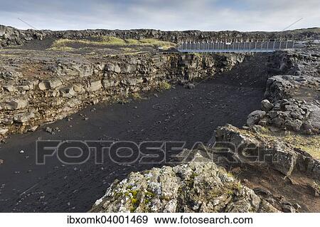 "Bridge between the continents crosses the fracture zone between the American and European tectonic plates, Reykjanesskagi peninsula, Iceland, Europe" View Large Photo Image Stock Photo - "Bridge between the continents crosses the fracture zone between the American and European tectonic plates, Reykjanesskagi peninsula, Iceland, Europe". Fotosearch