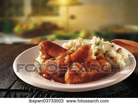 "British food, sausage, onion gravy and mashed potatoes" View Large Photo Image Stock Image - "British food, sausage, onion gravy and mashed potatoes". Fotosearch