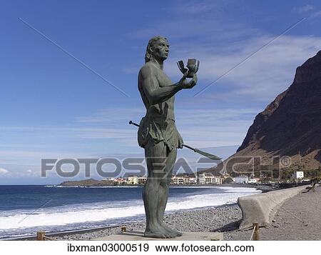 Stock Photo - "Bronze statue, monument to the Guanche warrior, Hautacuperche, looking towards La Playa, La Gomera, Valle Gran Rey, Canary Islands, Spain, Europe". Fotosearch