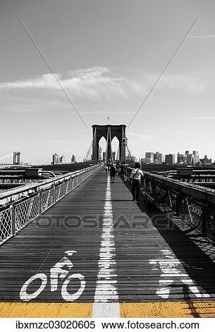 Stock Photography - "Brooklyn Bridge with markings for pedestrians and cyclists, Brooklyn Bridge, Manhatten, New York City, New York, United States, North America". Fotosearch