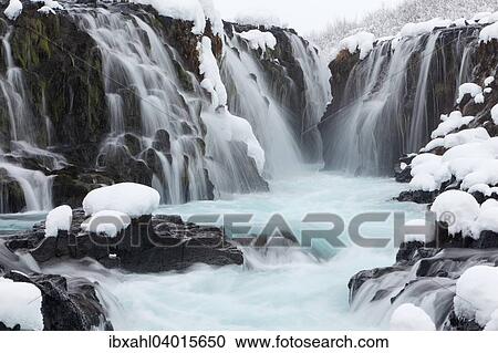 Stock Image - "Bruarfoss in winter, river Bruara, Southern Region, Iceland, Europe". Fotosearch