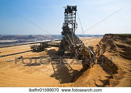 "Bucket-wheel excavator in an open pit, Grevenbroich, North Rhine-Westphalia, Germany, Europe" View Large Photo Image Stock Image - "Bucket-wheel excavator in an open pit, Grevenbroich, North Rhine-Westphalia, Germany, Europe". Fotosearch