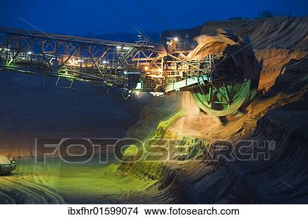 "Bucket wheel of an overburden excavator at work, Grevenbroich, North Rhine-Westphalia, Germany, Europe" View Large Photo Image Picture - "Bucket wheel of an overburden excavator at work, Grevenbroich, North Rhine-Westphalia, Germany, Europe". Fotosearch