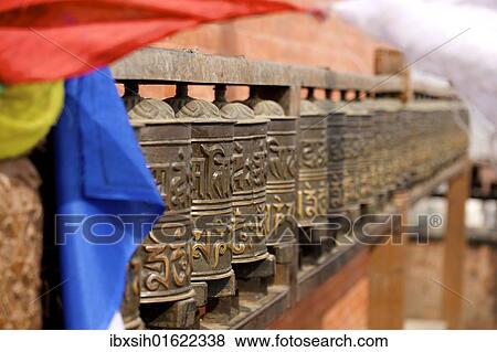 "Buddhist prayer wheels on the exterior wall of the Swayambhunath Stupa Temple, also called Monkey Temple, Kathmandu, Nepal, Asia" View Large Photo Image Stock Photo - "Buddhist prayer wheels on the exterior wall of the Swayambhunath Stupa Temple, also called Monkey Temple, Kathmandu, Nepal, Asia". Fotosearch