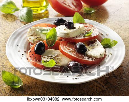 "Buffalo mozzarella, basil, olives and tomato salad" View Large Photo Image Stock Image - "Buffalo mozzarella, basil, olives and tomato salad". Fotosearch