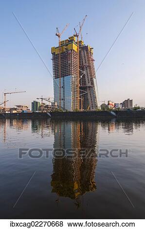 "Building site of the European Central Bank, ECB, at sunrise on the site of the former wholesale market halls with construction cranes, Frankfurt am Main, Hesse, Germany, Europe, PublicGround, Europe" View Large Photo Image Stock Photo - "Building site of the European Central Bank, ECB, at sunrise on the site of the former wholesale market halls with construction cranes, Frankfurt am Main, Hesse, Germany, Europe, PublicGround, Europe". Fotosearch