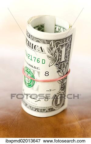 Bundle of dollar bills View Large Photo Image Stock Photo - Bundle of dollar bills. Fotosearch