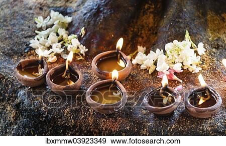 "Burning candles in clay pots, Brahadhiswara Temple, Thanjavur, Tamil Nadu, India, Asia" View Large Photo Image Stock Photo - "Burning candles in clay pots, Brahadhiswara Temple, Thanjavur, Tamil Nadu, India, Asia". Fotosearch