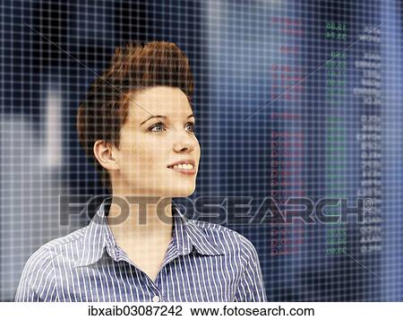 Business woman with a punk hairstyle in front of a stock exchange board View Large Photo Image Stock Image - Business woman with a punk hairstyle in front of a stock exchange board. Fotosearch