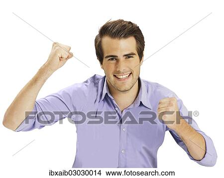 Picture - "Businessman clenching fists, happy, optimistic". Fotosearch