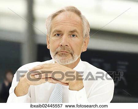 "Businessman, enior, thoughtful or worried expression at the stock exchange" View Large Photo Image Stock Photo - "Businessman, enior, thoughtful or worried expression at the stock exchange". Fotosearch