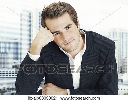 "Businessman in office, relaxed" View Large Photo Image Stock Image - "Businessman in office, relaxed". Fotosearch
